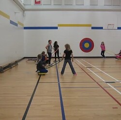 students playing in a gymnasium